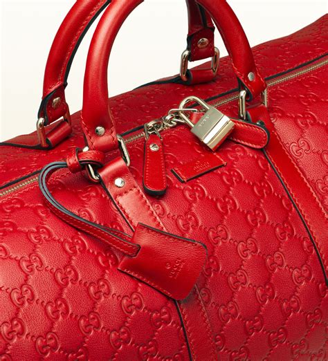 red gucci duffle bag|Gucci duffle bag for women.